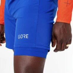 Gore Wear R5 2in1 Short Homme Bleu -Salomon Vetements Boutique main eyJwYXRoIjoiZ29yZVwvZmlsZVwvekRRUWh1UW5TSDZFYjh6czFhYXUuanBnIn0 gore IviMK a14b